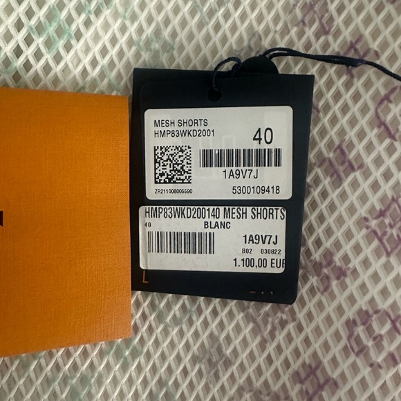 Louis Vuitton Mesh Monogram Shorts  
Worn 3x 
Size: 40 
Color: Milk White/Multi - Picture 7 of 9